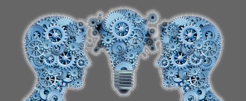 two heads with turning gears facing each other